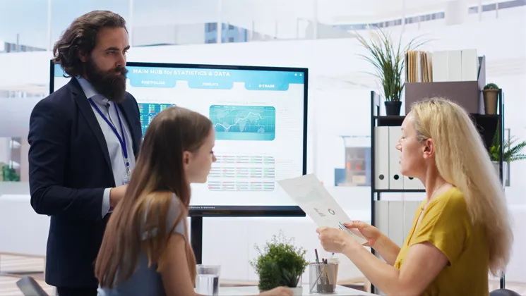 Business team reviewing data driven marketing strategies