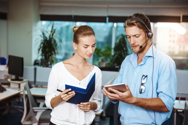 Customer support team improving business software implementation