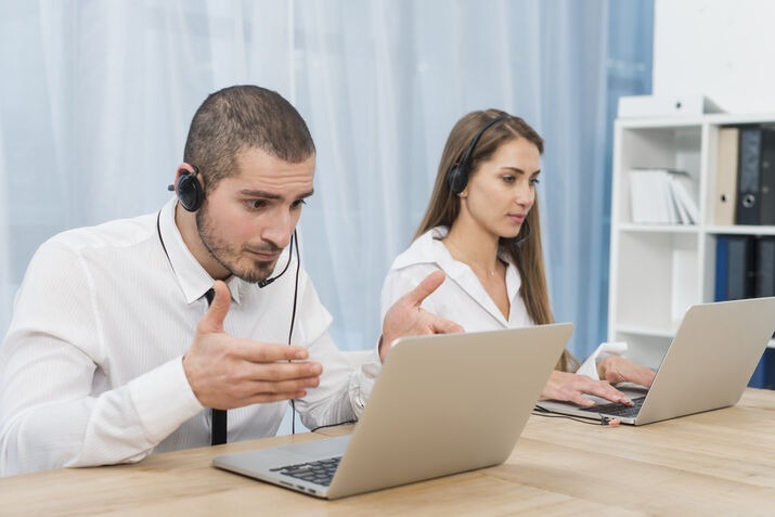 Outsourced customer support team handling customer inquiries