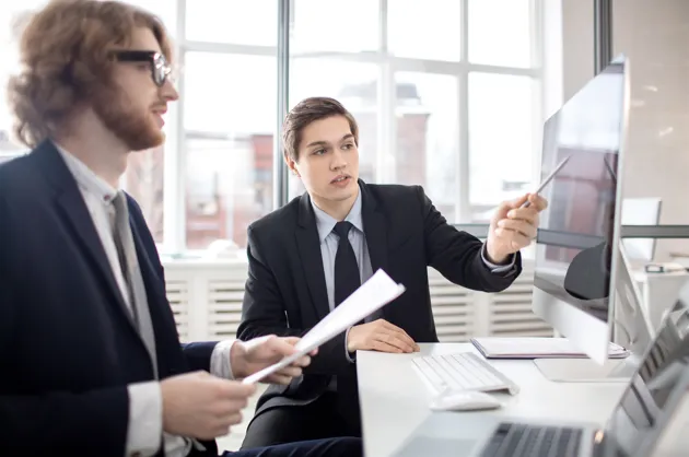 Professionals discussing enterprise data security implementation strategies