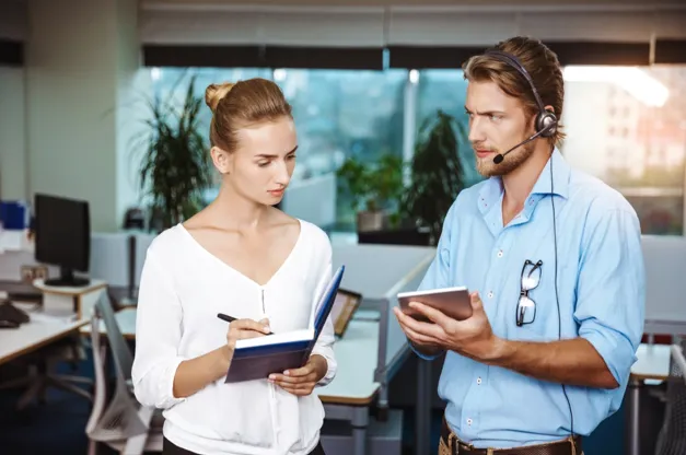 Customer support staff reviewing client service requests